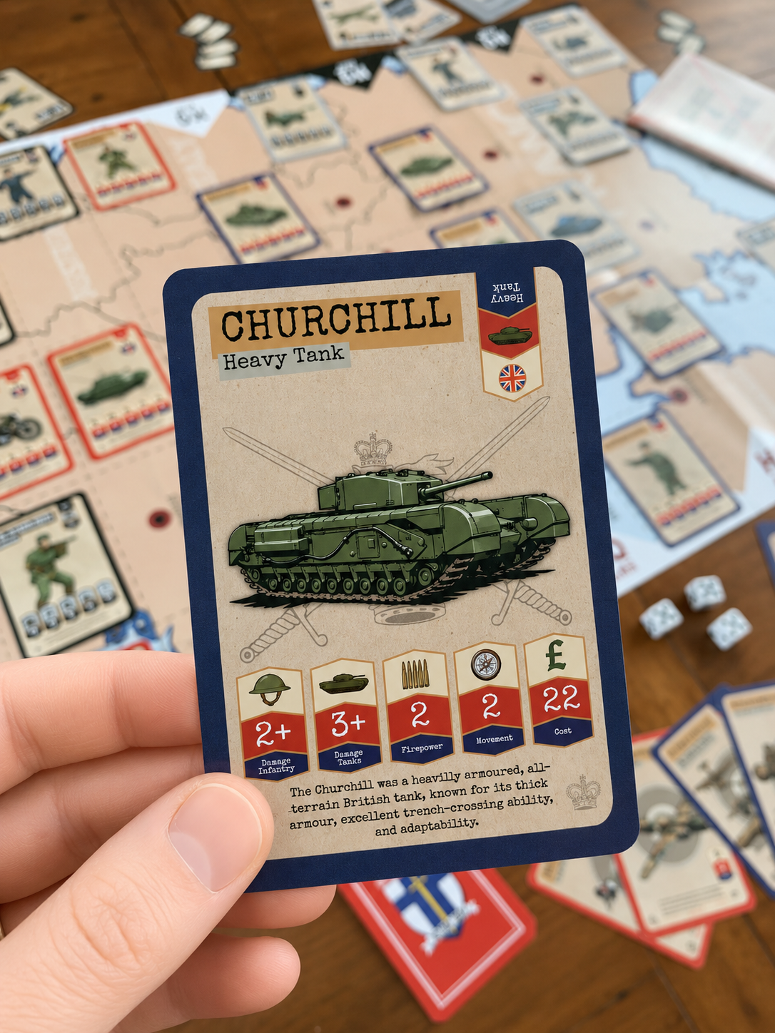 Card featuring a Churchill Heavy Tank from a ww2 board game held by a hand.